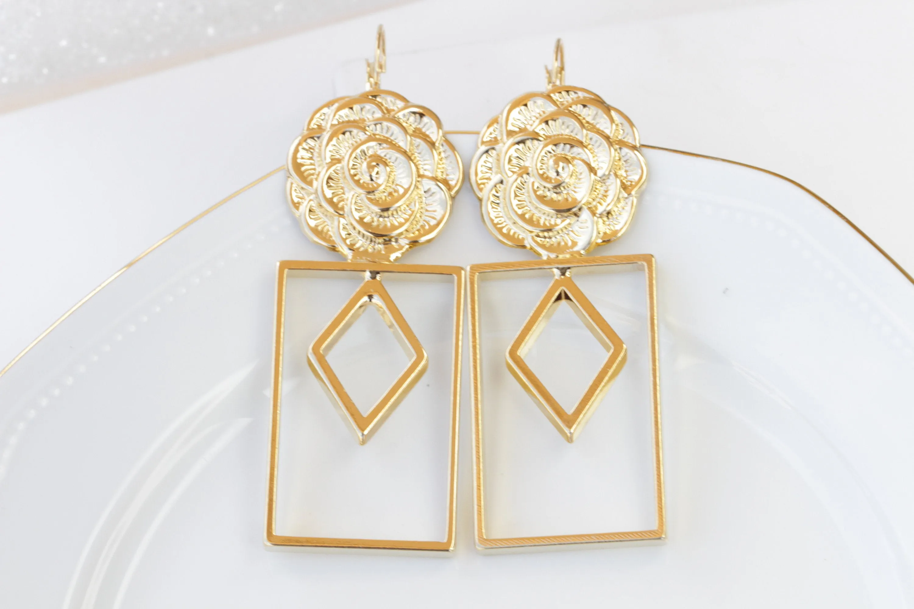 GOLD STATEMENT EARRINGS