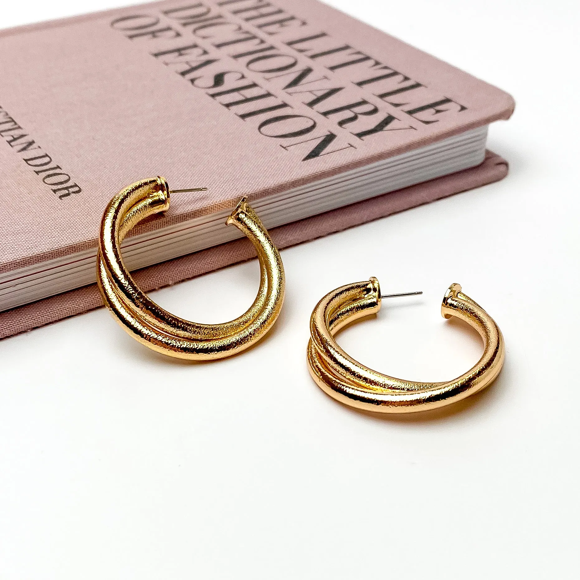 Twisted Hoop Earrings in Textured Gold Tone